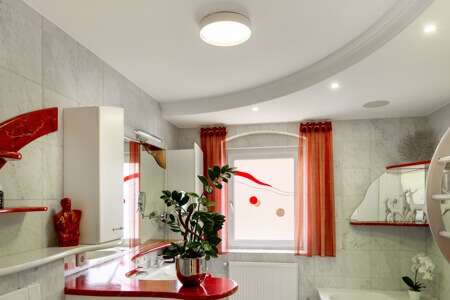 Bathroom with ceiling light in center.