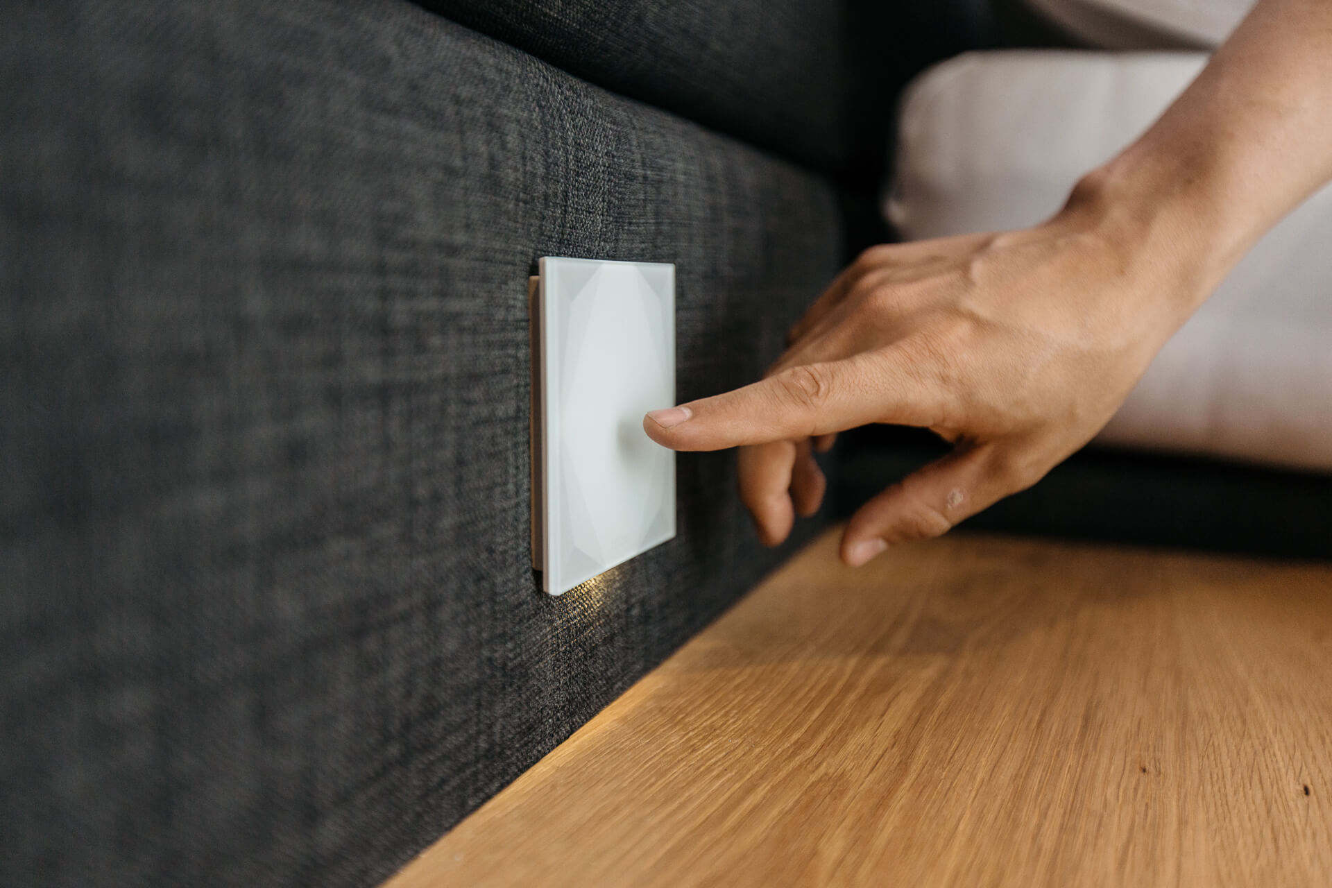 Hand using Touch Pure near bedside