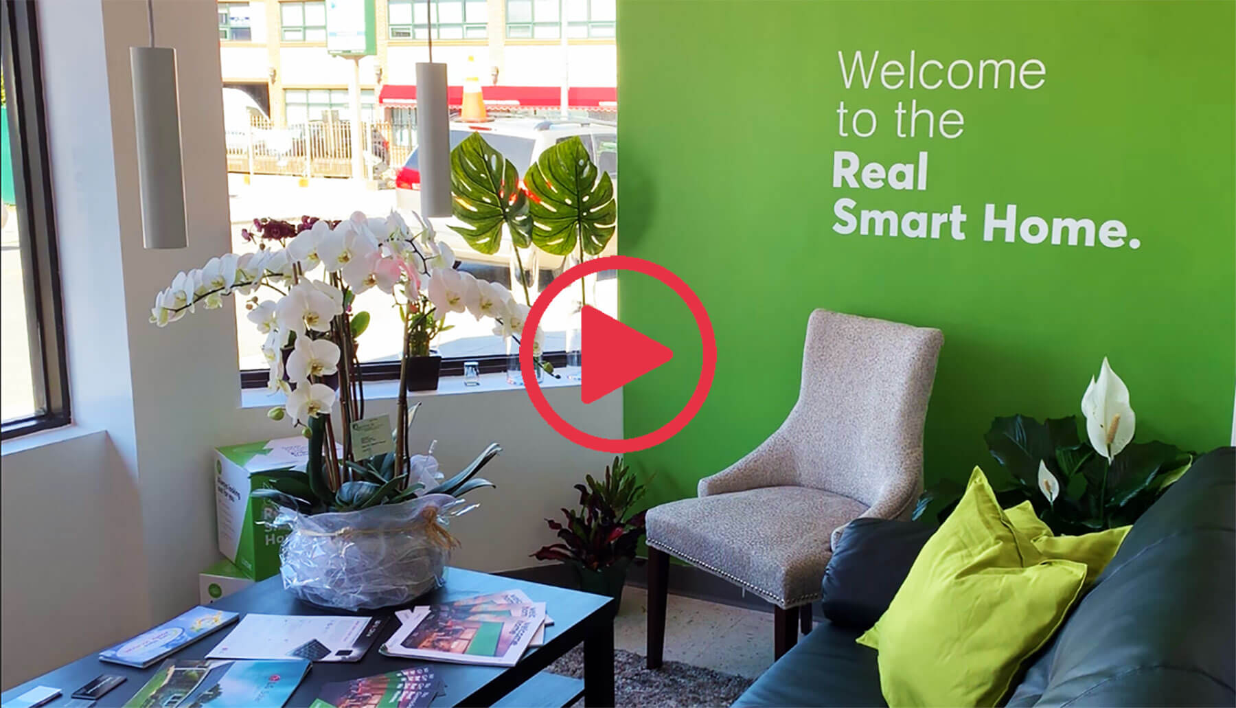 Foyer of InHomeSmart Showroom with play video button