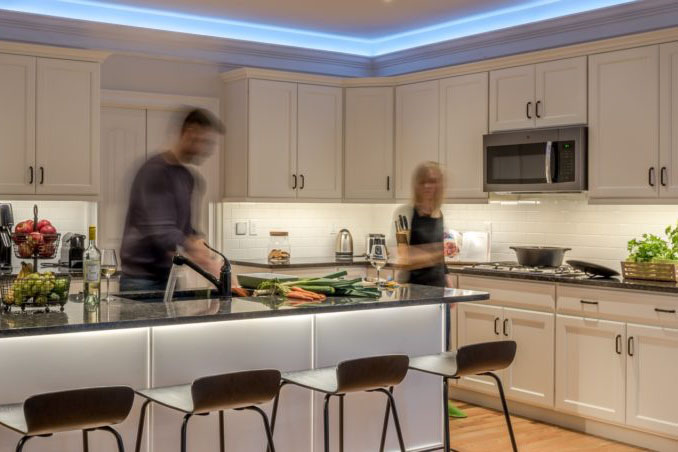 People cooking in kitchen with lighting mood