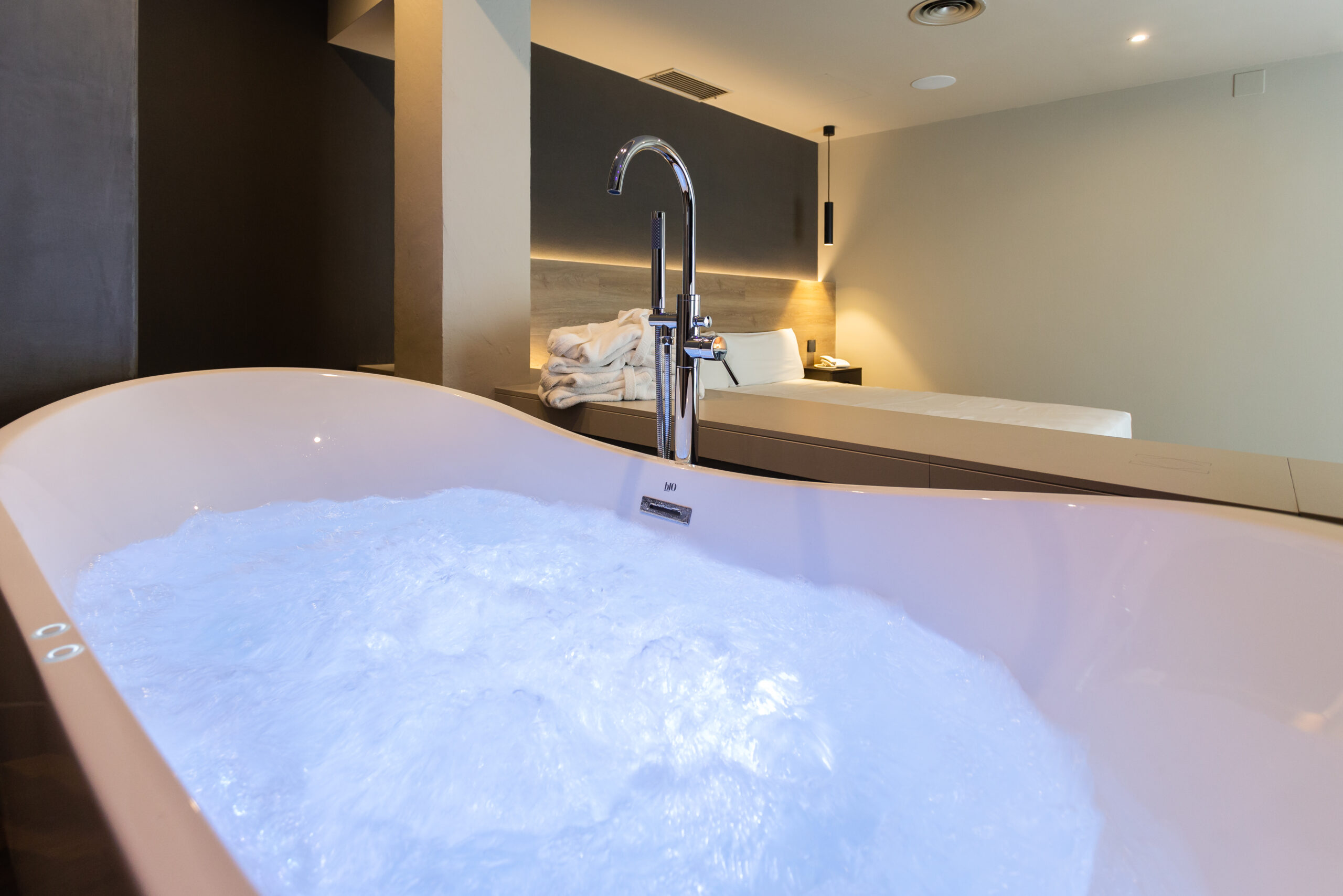 whirlpool bathtub in hotel room