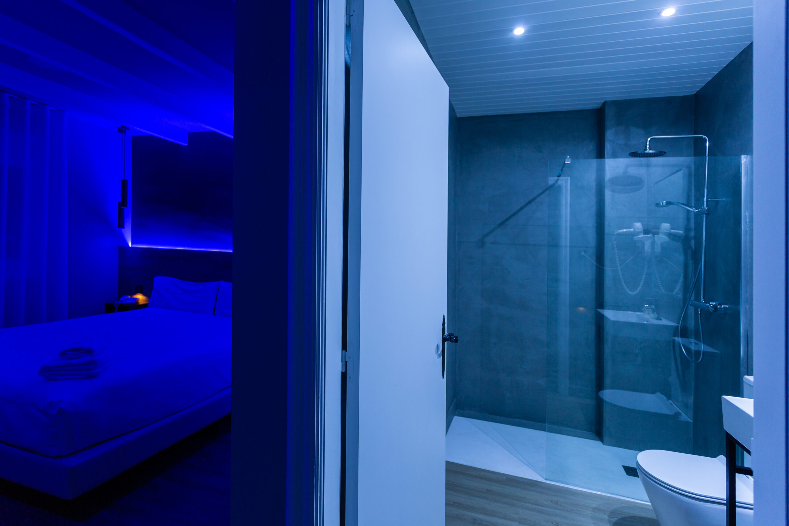 hotel room in night mode with blue lighting