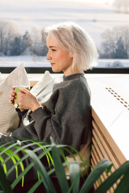 pretty lady enjoying smart climate control