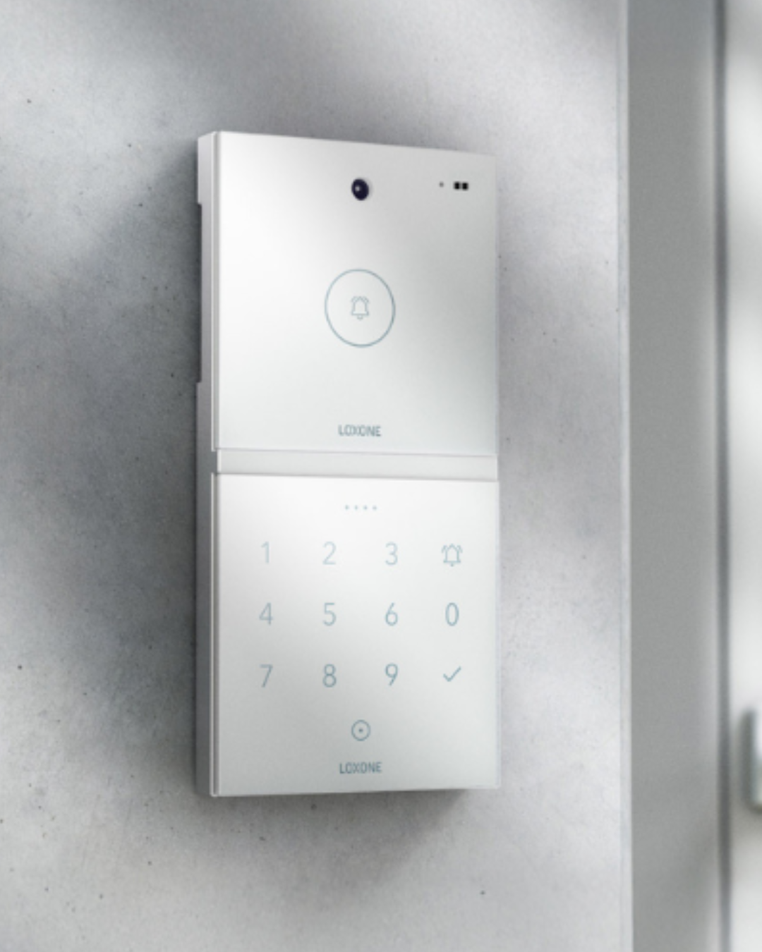 loxone access control security system mounted on a white wall