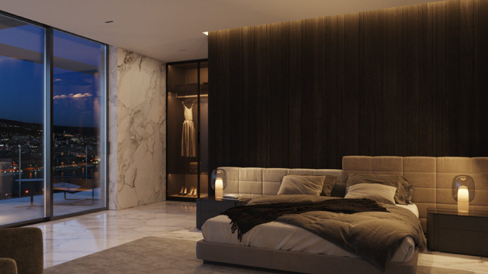 Spálňa so šatníkom a výhľadom na nočnú Bratislavu