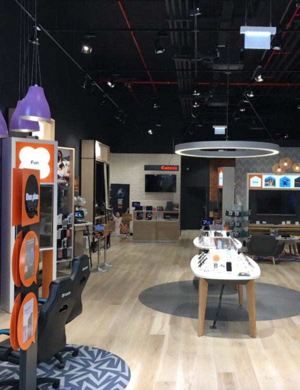 Orange-Filialen: automatisierte Beleuchtung